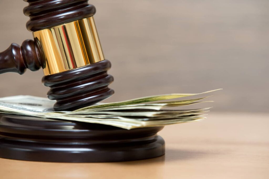 Wooden gavel on a judge’s block