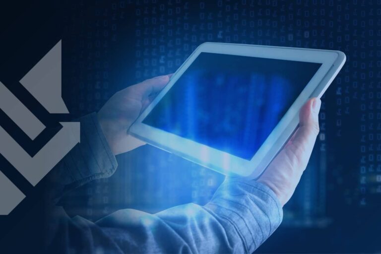 Digital tablet displaying blue light and data patterns held by a user, symbolizing the automated infrastructure and privacy shifts behind what is programmatic advertising.